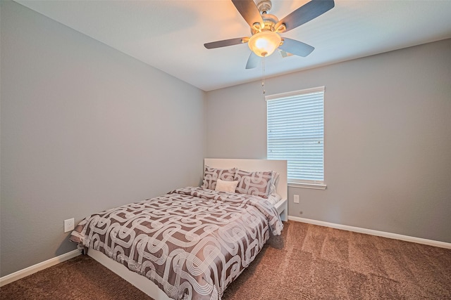 5615 Gemstone Park Rd, Richmond, TX 77407 - bedroom featuring carpet, baseboards, and a ceiling fan