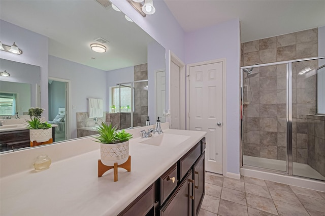 5615 Gemstone Park Rd, Richmond, TX 77407 - full bath featuring vanity, a shower stall, and tile patterned floors