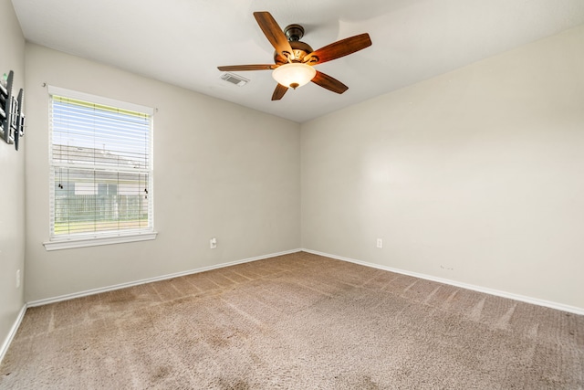 6733 Hidden Colony Ln, Dickinson, TX 77539 - unfurnished room featuring carpet flooring, a ceiling fan, baseboards, and healthy amount of natural light