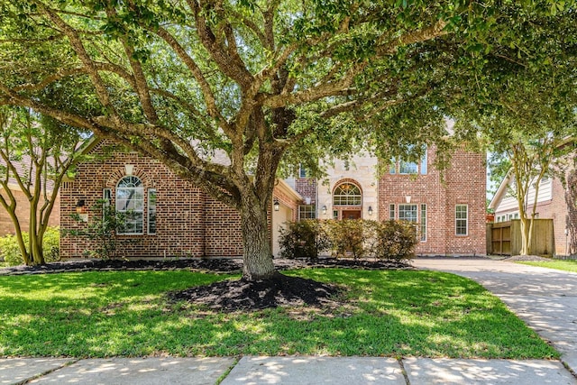 5122 Hidden Brook Ln, League City, TX 77573 - view of front of house with brick siding and driveway