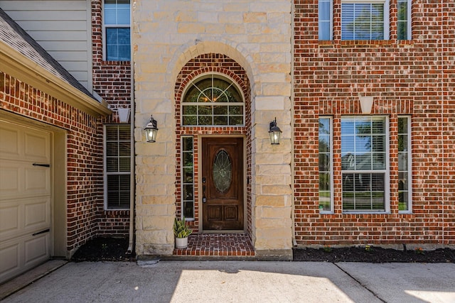 5122 Hidden Brook Ln, League City, TX 77573 - doorway to property featuring brick siding