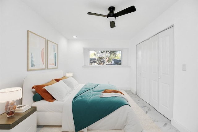 6035 Cartagena St, Houston, TX 77035 - bedroom featuring marble finish floors, a closet, ceiling fan, baseboards, and recessed lighting