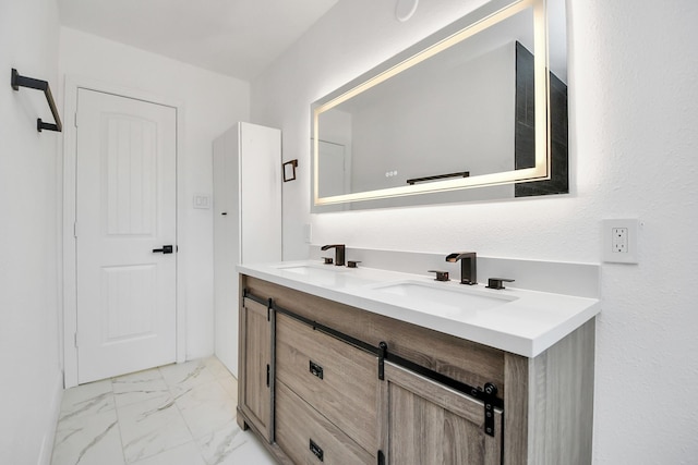 6035 Cartagena St, Houston, TX 77035 - bathroom with double vanity and marble look tile flooring