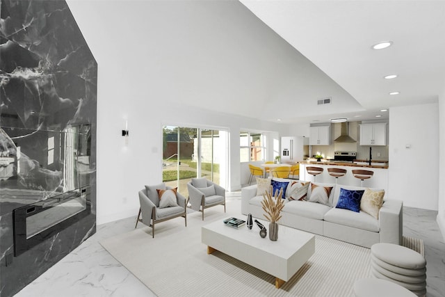 6035 Cartagena St, Houston, TX 77035 - living area with recessed lighting and light marble finish floors