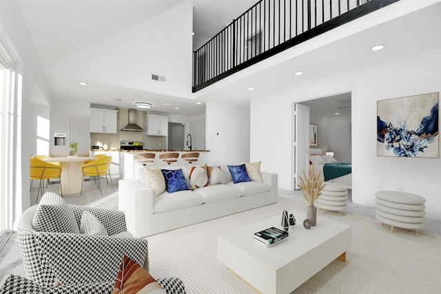 6035 Cartagena St, Houston, TX 77035 - living room with a high ceiling and recessed lighting
