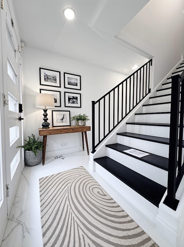 6035 Cartagena St, Houston, TX 77035 - staircase featuring marble finish flooring and recessed lighting