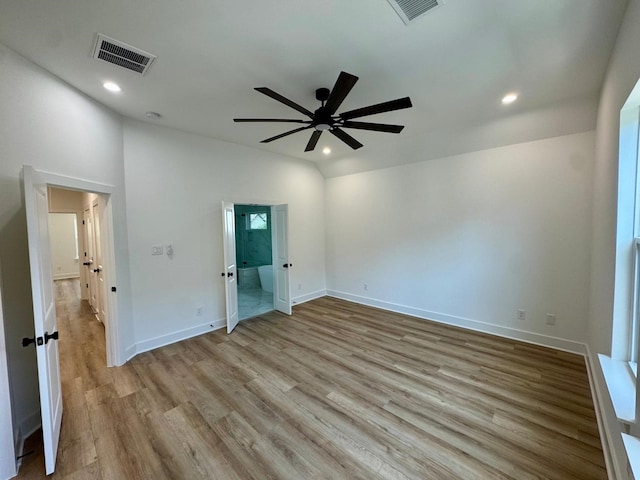 1631 Beall St, Houston, TX 77008 - empty room featuring wood finished floors, a ceiling fan, recessed lighting, baseboards, and lofted ceiling