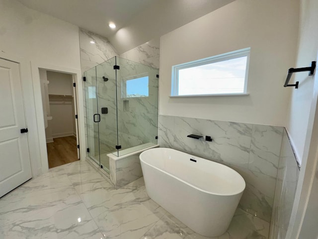 1631 Beall St, Houston, TX 77008 - full bathroom with a spacious closet, a marble finish shower, marble finish flooring, a freestanding bath, and tile walls