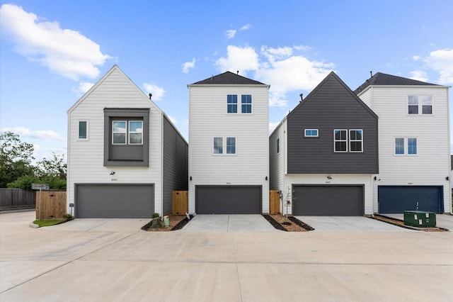 8303 Springwood Creek Ln, Houston, TX 77055 - view of front facade with an attached garage and driveway