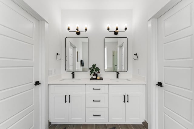 8303 Springwood Creek Ln, Houston, TX 77055 - full bath featuring double vanity and wood finished floors