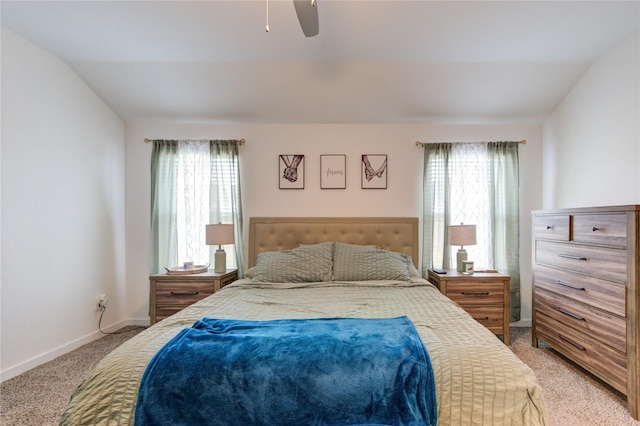31814 Hallington Hill Ln, Fulshear, TX 77441 - bedroom with light colored carpet, multiple windows, baseboards, and ceiling fan