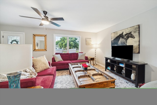 14022 Roundstone Ln, Houston, TX 77015 - living room featuring ceiling fan and baseboards