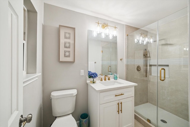 14022 Roundstone Ln, Houston, TX 77015 - bathroom with a shower stall, vanity, and toilet