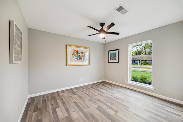 14022 Roundstone Ln, Houston, TX 77015 - spare room featuring wood finished floors, baseboards, and a ceiling fan