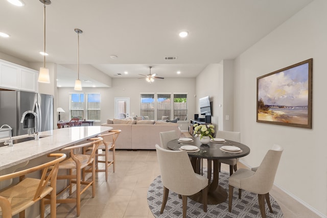 8957 Monterey View Dr, Houston, TX 77080 - dining area with recessed lighting, light tile patterned flooring, and a ceiling fan