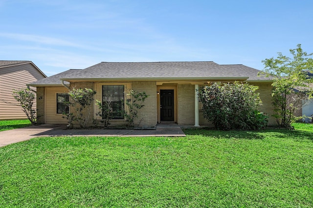 16243 Knollridge Ct, Houston, TX 77053 - view of front of property with a front yard, brick siding, and a shingled roof