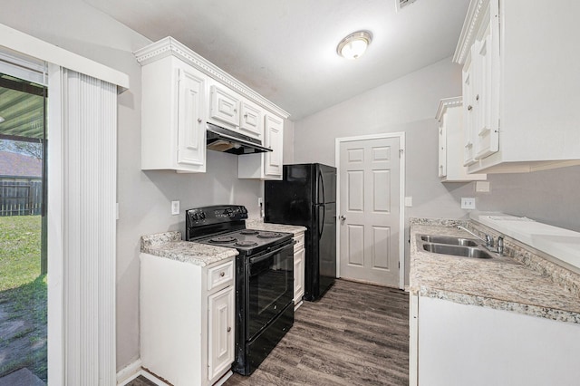 16243 Knollridge Ct, Houston, TX 77053 - kitchen featuring black appliances, under cabinet range hood, vaulted ceiling, a sink, and dark wood-style floors