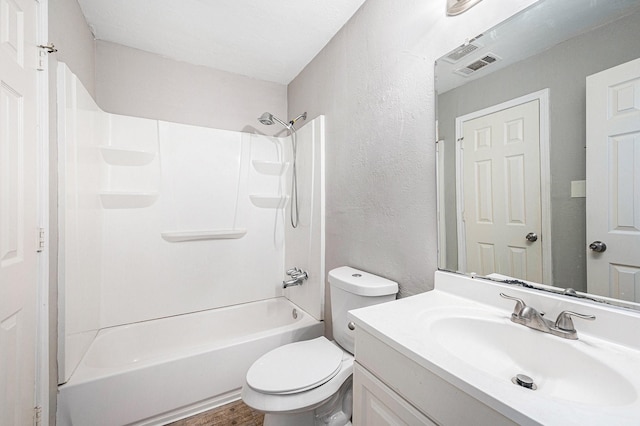 16243 Knollridge Ct, Houston, TX 77053 - bathroom featuring a textured wall, toilet, vanity, shower / bath combination, and wood finished floors