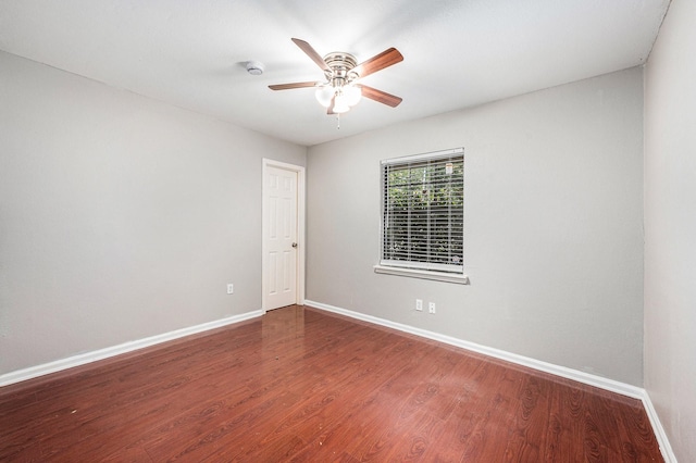 16243 Knollridge Ct, Houston, TX 77053 - unfurnished room with baseboards, wood finished floors, ceiling fan, and a smoke detector