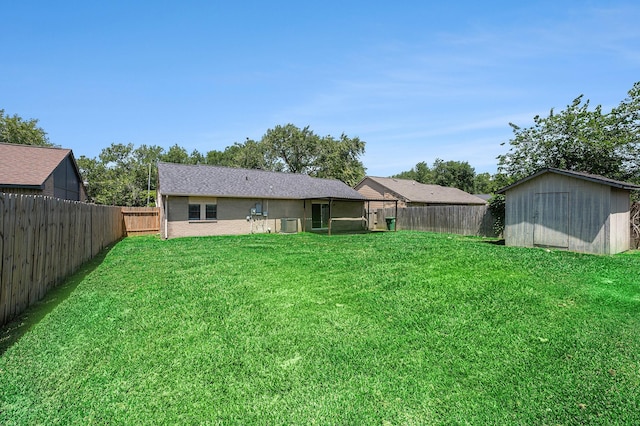 16243 Knollridge Ct, Houston, TX 77053 - view of yard featuring a storage shed, an outdoor structure, and central air condition unit