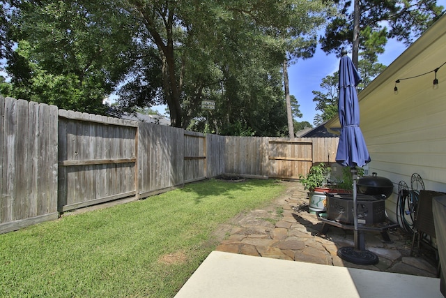 11802 Guernsey Dr, Tomball, TX 77377 - view of yard featuring a patio