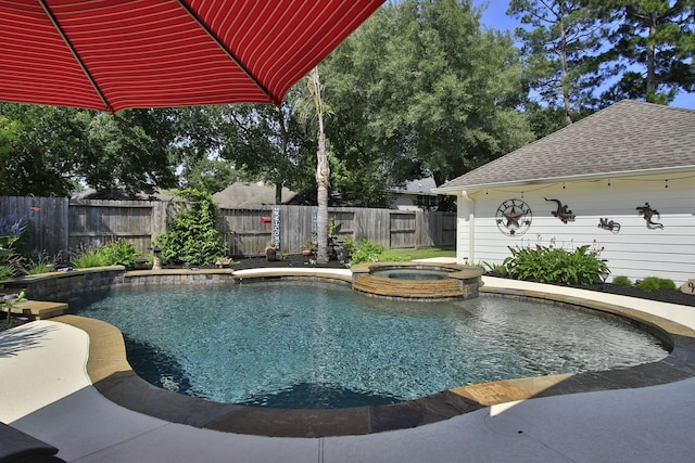 11802 Guernsey Dr, Tomball, TX 77377 - view of pool with a pool with connected hot tub and a fenced backyard