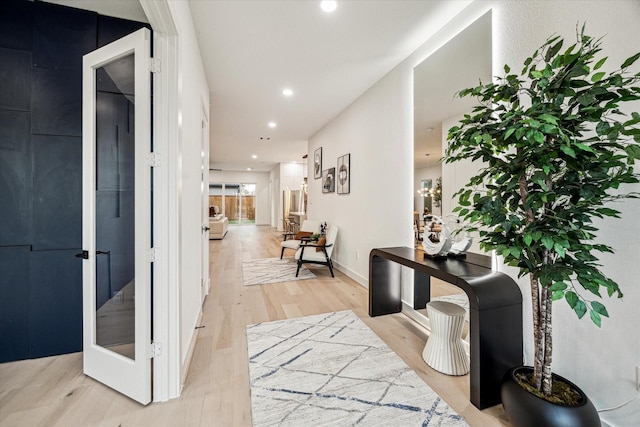 709 Moody St, Houston, TX 77009 - hall with recessed lighting, light wood-type flooring, and baseboards