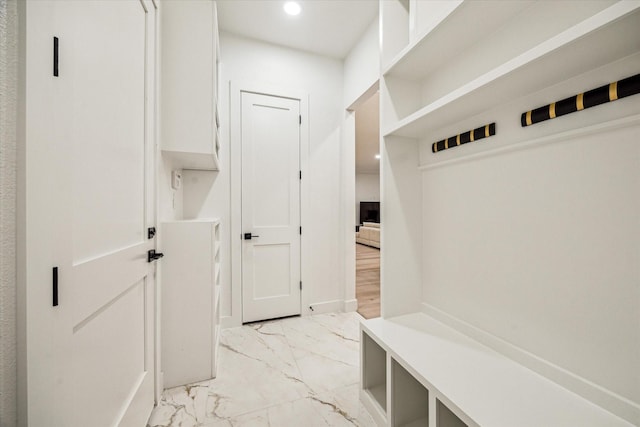 709 Moody St, Houston, TX 77009 - mudroom with light marble finish floors and recessed lighting