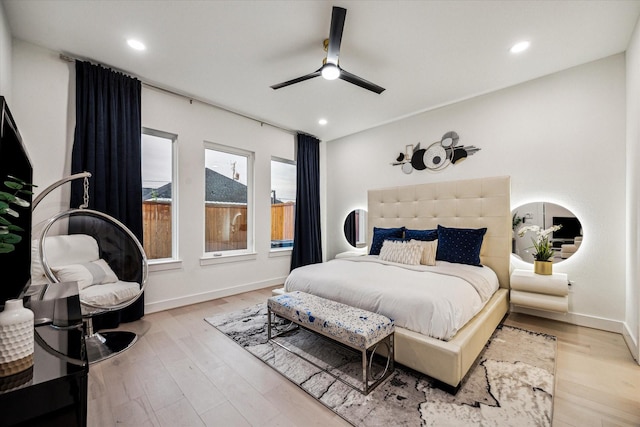 709 Moody St, Houston, TX 77009 - bedroom with light wood-style floors, baseboards, recessed lighting, and ceiling fan