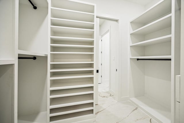 709 Moody St, Houston, TX 77009 - spacious closet featuring marble finish floors