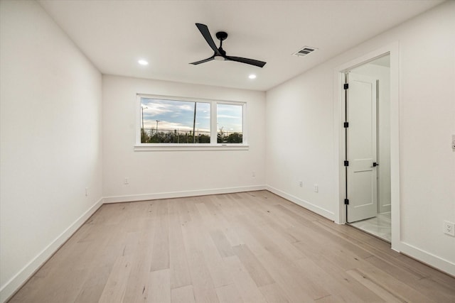 709 Moody St, Houston, TX 77009 - spare room with a ceiling fan, light wood-style flooring, recessed lighting, and baseboards
