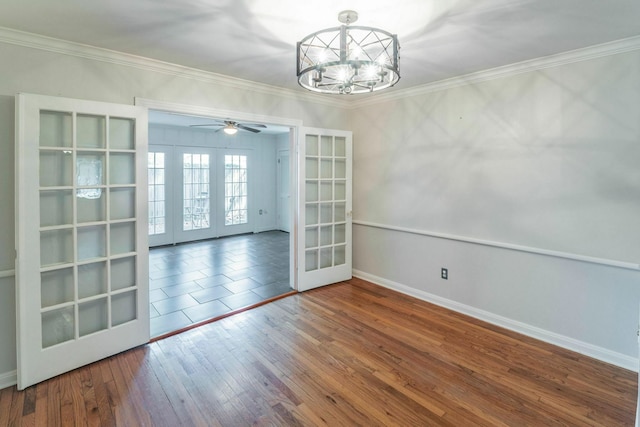 1062 Lamonte Ln, Houston, TX 77018 - unfurnished dining area featuring french doors, a chandelier, baseboards, ornamental molding, and hardwood / wood-style floors