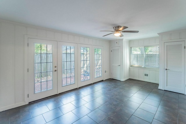 1062 Lamonte Ln, Houston, TX 77018 - doorway to outside with ceiling fan, a decorative wall, tile patterned flooring, and french doors