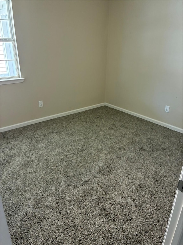 19638 Plantation Grove Trl, Katy, TX 77449 - spare room featuring carpet and baseboards