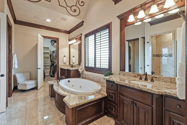 14 Royal King Rd, Tomball, TX 77377 - full bath featuring crown molding, a tub with jets, marble finish floors, two vanities, and a spacious closet