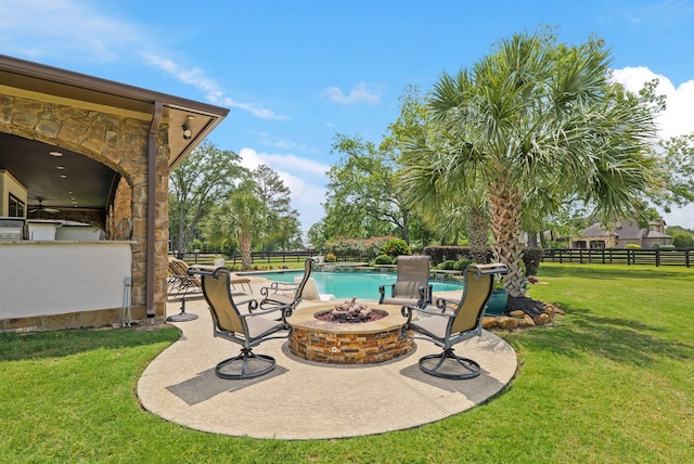 14 Royal King Rd, Tomball, TX 77377 - view of patio featuring a fire pit