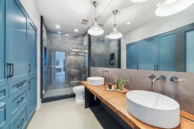 2019 Du Barry Ln, Houston, TX 77018 - full bathroom with toilet, a stall shower, tile patterned floors, double vanity, and recessed lighting