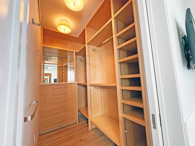 2019 Du Barry Ln, Houston, TX 77018 - walk in closet featuring wood finished floors