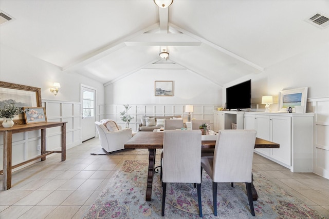 2023 Du Barry Ln, Houston, TX 77018 - dining room featuring light tile patterned floors, a decorative wall, and a wainscoted wall