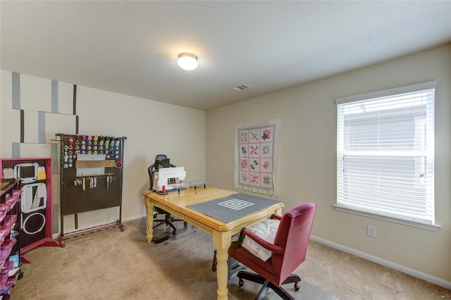 carpeted office featuring baseboards