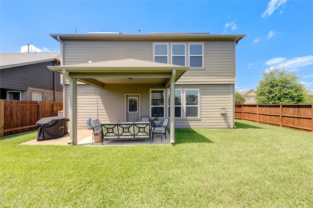 back of property with a patio area and an outdoor living space