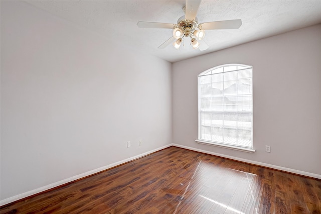 2710 Grants Lake Blvd Unit L8, Sugar Land, TX 77479 - unfurnished room featuring plenty of natural light, baseboards, and wood finished floors