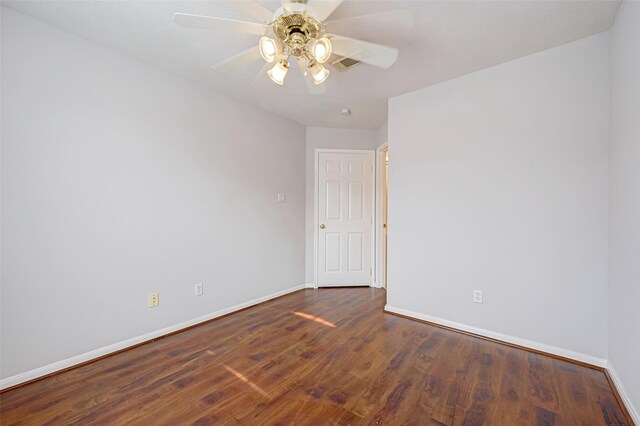 2710 Grants Lake Blvd Unit L8, Sugar Land, TX 77479 - empty room with baseboards, wood finished floors, and a ceiling fan