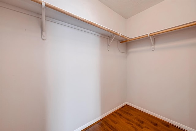 2710 Grants Lake Blvd Unit L8, Sugar Land, TX 77479 - spacious closet featuring wood finished floors