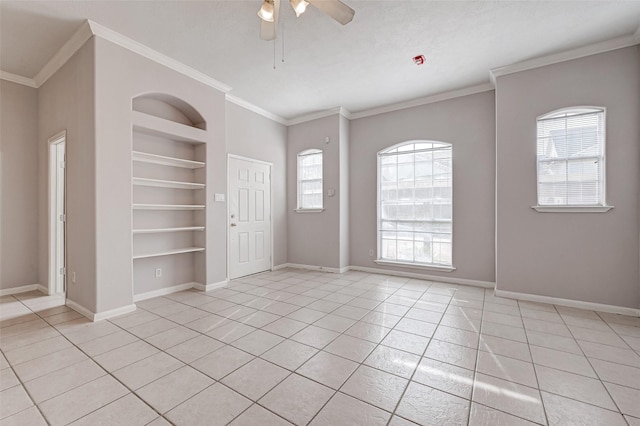 2710 Grants Lake Blvd Unit L8, Sugar Land, TX 77479 - empty room featuring built in shelves, light tile patterned floors, crown molding, ceiling fan, and plenty of natural light