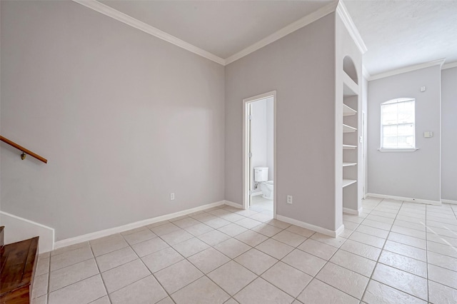 2710 Grants Lake Blvd Unit L8, Sugar Land, TX 77479 - unfurnished room with crown molding, light tile patterned floors, and baseboards