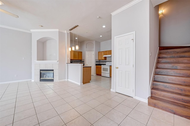 2710 Grants Lake Blvd Unit L8, Sugar Land, TX 77479 - unfurnished living room with ornamental molding, light tile patterned floors, baseboards, stairway, and recessed lighting