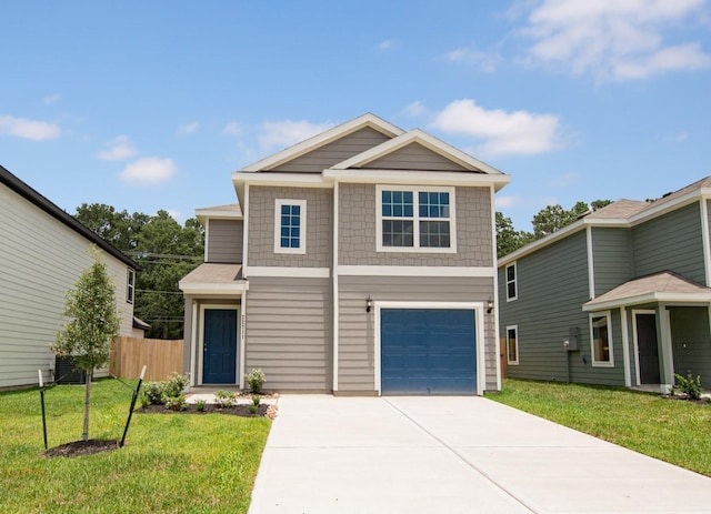 22711 American Kestrel Ct, Splendora, TX 77372 - view of front facade with an attached garage and concrete driveway