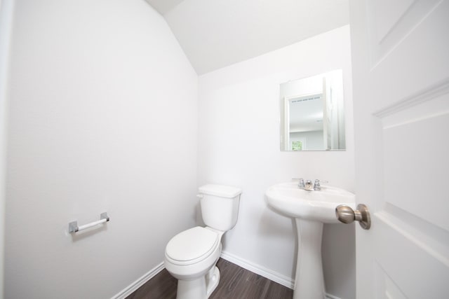 22711 American Kestrel Ct, Splendora, TX 77372 - bathroom featuring wood finished floors and lofted ceiling