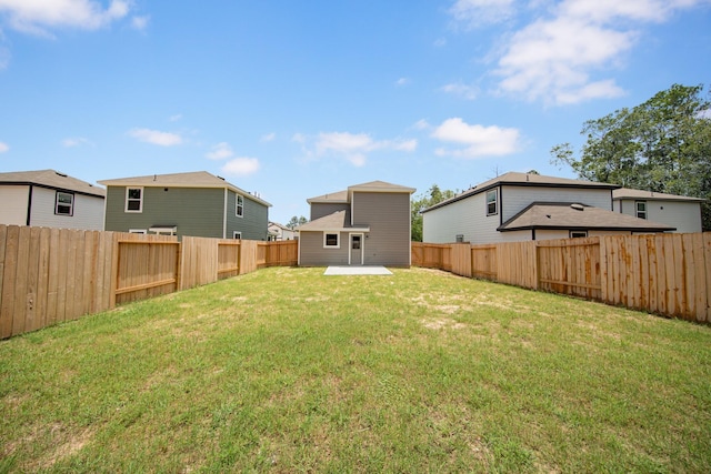 22711 American Kestrel Ct, Splendora, TX 77372 - fenced backyard featuring a patio area